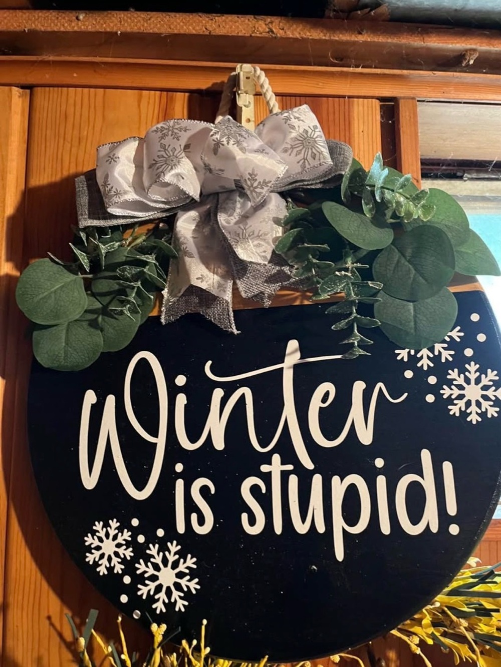 Winter Is Stupid! Black Holiday Door Sign with Greenery and Bow